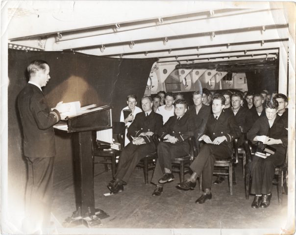 Navy chaplain leading worship